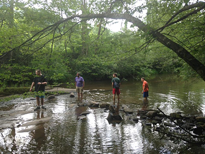 Youth in creek